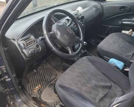 Синий Форд Эскорт, объемом двигателя 1.8 л и пробегом 250 тыс. км за 1350 $, фото 1 на Automoto.ua