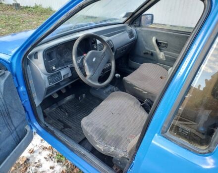 Синий Форд Эскорт, объемом двигателя 1.4 л и пробегом 256 тыс. км за 550 $, фото 5 на Automoto.ua