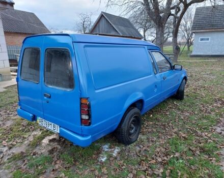 Синий Форд Эскорт, объемом двигателя 1.4 л и пробегом 256 тыс. км за 550 $, фото 1 на Automoto.ua