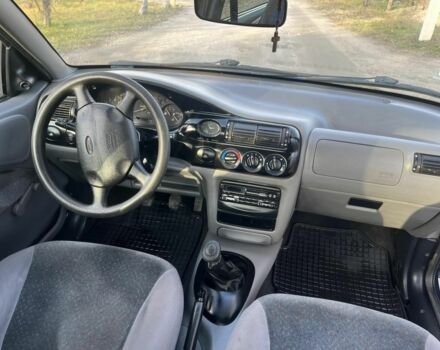 Синий Форд Эскорт, объемом двигателя 1.6 л и пробегом 115 тыс. км за 1300 $, фото 4 на Automoto.ua