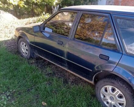 Синий Форд Эскорт, объемом двигателя 1.3 л и пробегом 200 тыс. км за 650 $, фото 2 на Automoto.ua