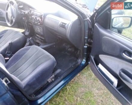 Синий Форд Эскорт, объемом двигателя 1.6 л и пробегом 150 тыс. км за 600 $, фото 7 на Automoto.ua