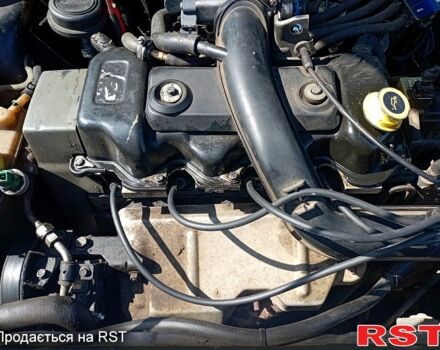 Синій Форд Ескорт, об'ємом двигуна 1.4 л та пробігом 300 тис. км за 1150 $, фото 1 на Automoto.ua