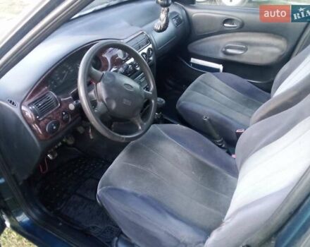 Синий Форд Эскорт, объемом двигателя 1.6 л и пробегом 150 тыс. км за 600 $, фото 4 на Automoto.ua