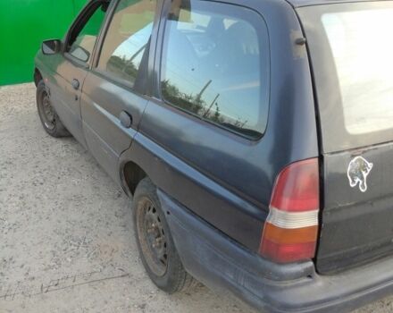 Синий Форд Эскорт, объемом двигателя 1.4 л и пробегом 300 тыс. км за 1300 $, фото 3 на Automoto.ua