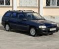 Синий Форд Эскорт, объемом двигателя 1.4 л и пробегом 200 тыс. км за 600 $, фото 1 на Automoto.ua
