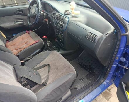 Синий Форд Эскорт, объемом двигателя 1.4 л и пробегом 41 тыс. км за 1600 $, фото 12 на Automoto.ua