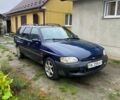 Синий Форд Эскорт, объемом двигателя 1.8 л и пробегом 250 тыс. км за 950 $, фото 1 на Automoto.ua