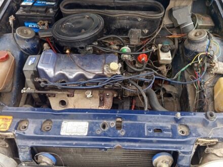 Синий Форд Эскорт, объемом двигателя 1.4 л и пробегом 777 тыс. км за 608 $, фото 1 на Automoto.ua