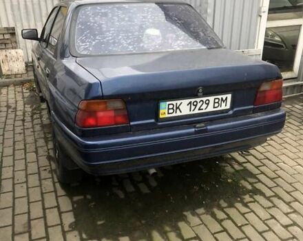 Синій Форд Ескорт, об'ємом двигуна 1.39 л та пробігом 100 тис. км за 1250 $, фото 1 на Automoto.ua