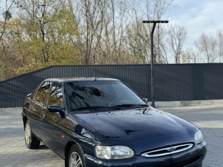 Синий Форд Эскорт, объемом двигателя 1.8 л и пробегом 300 тыс. км за 1000 $, фото 1 на Automoto.ua