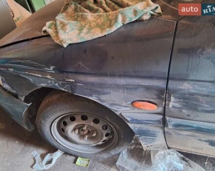 Синий Форд Эскорт, объемом двигателя 1.4 л и пробегом 500 тыс. км за 700 $, фото 1 на Automoto.ua