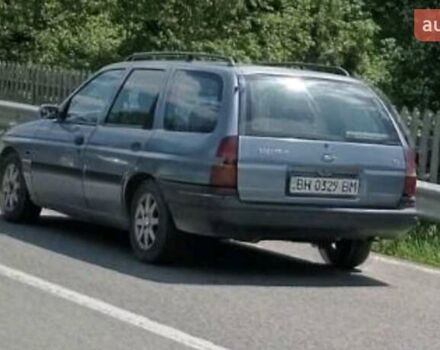 Синий Форд Эскорт, объемом двигателя 1.8 л и пробегом 500 тыс. км за 1100 $, фото 1 на Automoto.ua