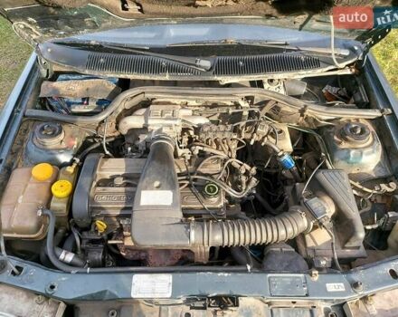 Зеленый Форд Эскорт, объемом двигателя 1.8 л и пробегом 436 тыс. км за 1999 $, фото 9 на Automoto.ua