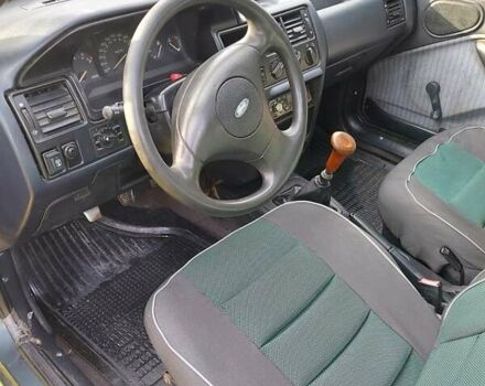 Зеленый Форд Эскорт, объемом двигателя 1.8 л и пробегом 436 тыс. км за 1999 $, фото 13 на Automoto.ua