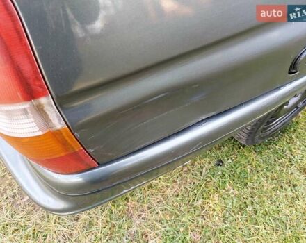 Зеленый Форд Эскорт, объемом двигателя 1.8 л и пробегом 436 тыс. км за 1999 $, фото 4 на Automoto.ua