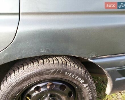 Зеленый Форд Эскорт, объемом двигателя 1.8 л и пробегом 436 тыс. км за 1999 $, фото 5 на Automoto.ua