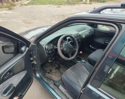 Зеленый Форд Эскорт, объемом двигателя 1.6 л и пробегом 220 тыс. км за 1100 $, фото 6 на Automoto.ua