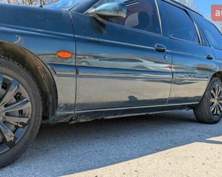 Зеленый Форд Эскорт, объемом двигателя 1.6 л и пробегом 217 тыс. км за 2000 $, фото 4 на Automoto.ua