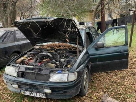 Зеленый Форд Эскорт, объемом двигателя 1.8 л и пробегом 420 тыс. км за 600 $, фото 1 на Automoto.ua