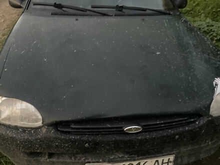 Зеленый Форд Эскорт, объемом двигателя 1.6 л и пробегом 210 тыс. км за 900 $, фото 1 на Automoto.ua