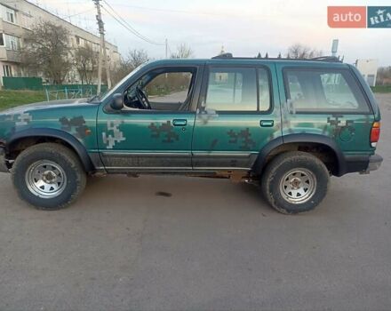 Зелений Форд Експлорер, об'ємом двигуна 4 л та пробігом 224 тис. км за 3500 $, фото 3 на Automoto.ua