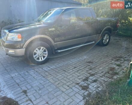 Чорний Форд Ф-150, об'ємом двигуна 5.4 л та пробігом 292 тис. км за 14000 $, фото 1 на Automoto.ua