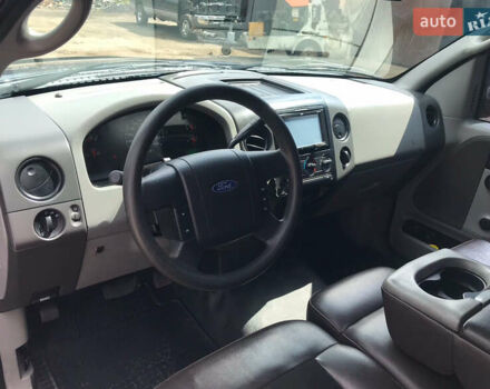 Синий Форд Ф-150, объемом двигателя 4.2 л и пробегом 260 тыс. км за 8800 $, фото 2 на Automoto.ua