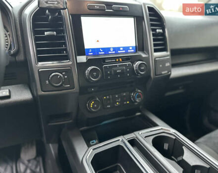 Синий Форд Ф-150, объемом двигателя 5 л и пробегом 220 тыс. км за 22900 $, фото 66 на Automoto.ua