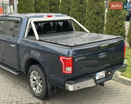 Синий Форд Ф-150, объемом двигателя 5 л и пробегом 220 тыс. км за 22900 $, фото 11 на Automoto.ua