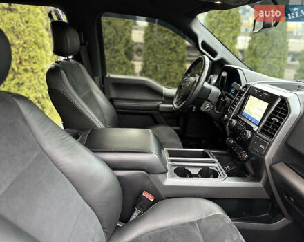 Синий Форд Ф-150, объемом двигателя 5 л и пробегом 220 тыс. км за 22900 $, фото 54 на Automoto.ua