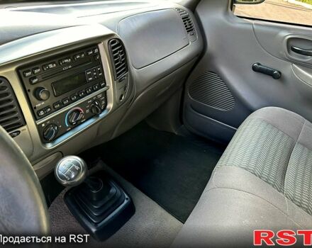 Синій Форд Ф-150, об'ємом двигуна 4.2 л та пробігом 0 тис. км за 12000 $, фото 6 на Automoto.ua
