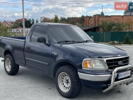 Синий Форд Ф-350, объемом двигателя 4.19 л и пробегом 200 тыс. км за 7200 $, фото 1 на Automoto.ua
