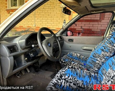 Белый Форд Фиеста, объемом двигателя 1.8 л и пробегом 220 тыс. км за 950 $, фото 1 на Automoto.ua