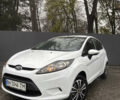 Белый Форд Фиеста, объемом двигателя 1.24 л и пробегом 212 тыс. км за 5400 $, фото 1 на Automoto.ua