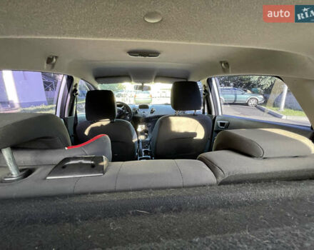 Білий Форд Фієста, об'ємом двигуна 1.24 л та пробігом 215 тис. км за 6000 $, фото 3 на Automoto.ua