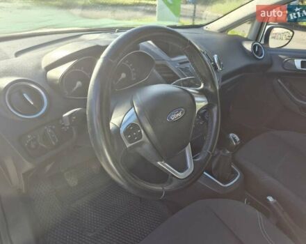 Білий Форд Фієста, об'ємом двигуна 1 л та пробігом 171 тис. км за 6499 $, фото 16 на Automoto.ua