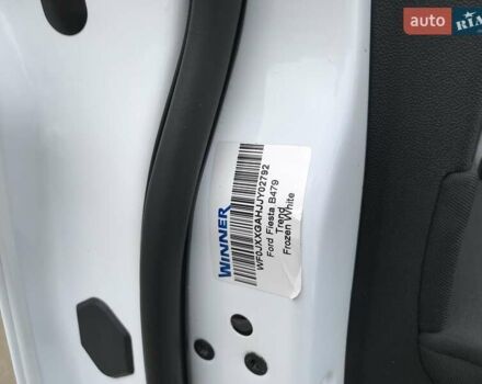 Білий Форд Фієста, об'ємом двигуна 1 л та пробігом 99 тис. км за 9900 $, фото 13 на Automoto.ua