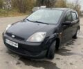 Черный Форд Фиеста, объемом двигателя 1.39 л и пробегом 180 тыс. км за 3600 $, фото 1 на Automoto.ua