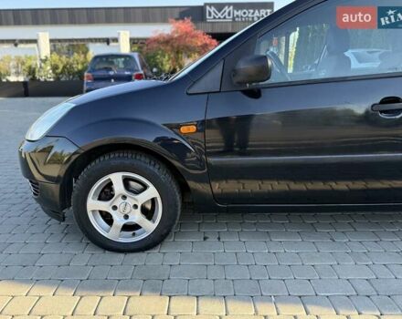 Черный Форд Фиеста, объемом двигателя 1.4 л и пробегом 155 тыс. км за 2999 $, фото 8 на Automoto.ua