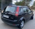 Черный Форд Фиеста, объемом двигателя 1.39 л и пробегом 150 тыс. км за 4250 $, фото 3 на Automoto.ua