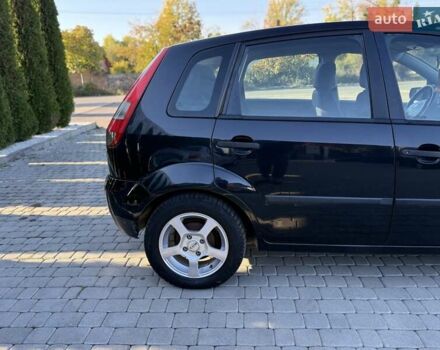 Черный Форд Фиеста, объемом двигателя 1.4 л и пробегом 155 тыс. км за 2999 $, фото 12 на Automoto.ua