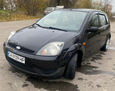 Черный Форд Фиеста, объемом двигателя 1.4 л и пробегом 160 тыс. км за 3600 $, фото 2 на Automoto.ua