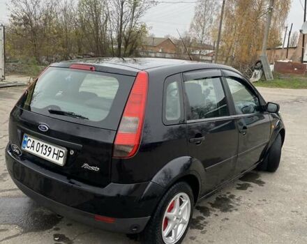 Черный Форд Фиеста, объемом двигателя 1.39 л и пробегом 180 тыс. км за 3600 $, фото 6 на Automoto.ua