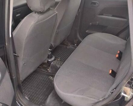 Черный Форд Фиеста, объемом двигателя 1.3 л и пробегом 218 тыс. км за 3900 $, фото 7 на Automoto.ua