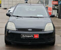 Черный Форд Фиеста, объемом двигателя 1.3 л и пробегом 167 тыс. км за 3990 $, фото 1 на Automoto.ua