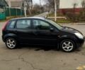 Черный Форд Фиеста, объемом двигателя 1.3 л и пробегом 163 тыс. км за 3600 $, фото 1 на Automoto.ua