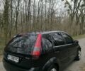 Черный Форд Фиеста, объемом двигателя 1.3 л и пробегом 260 тыс. км за 3600 $, фото 1 на Automoto.ua
