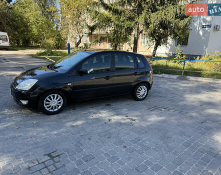 Чорний Форд Фієста, об'ємом двигуна 1.3 л та пробігом 242 тис. км за 3250 $, фото 14 на Automoto.ua
