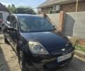 Черный Форд Фиеста, объемом двигателя 1.4 л и пробегом 290 тыс. км за 3700 $, фото 1 на Automoto.ua